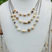 Load image into Gallery viewer, TALISA- Silver/ Neutral Multi colored Triple Strand Short Beaded Necklace
